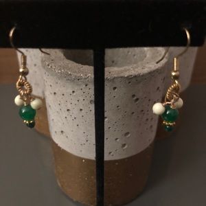 Green beaded dangle earrings